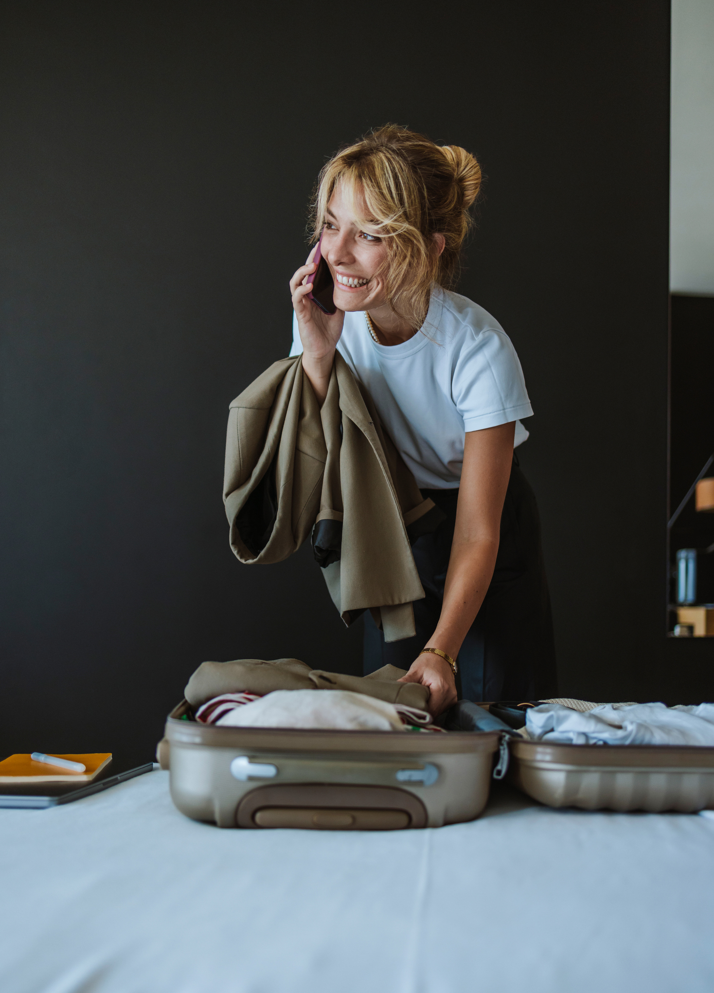woman unpacking on vacation